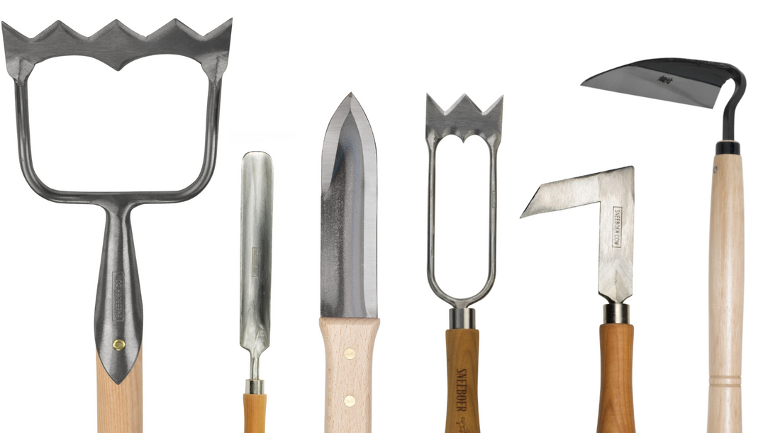 Weeding after this rain... tools at the ready
