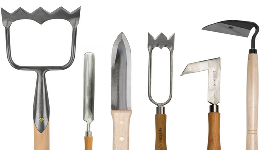 Weeding after this rain... tools at the ready