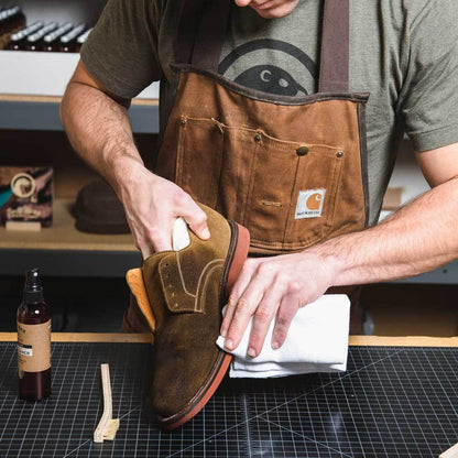 Otter Wax suede cleaner being wiped off shoe